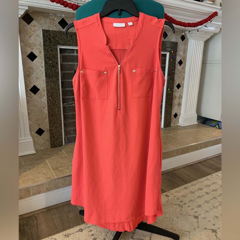Women’s zip front coral dress.